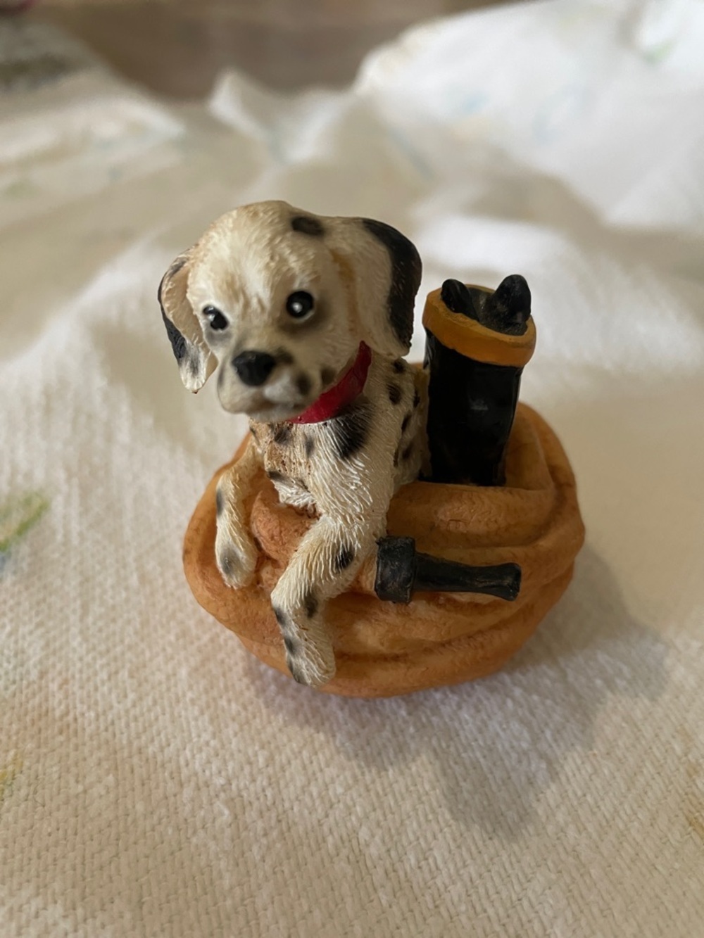 Small Dog Figurine in Tan Basket with Black Boot firehouse Dalmatian puppy